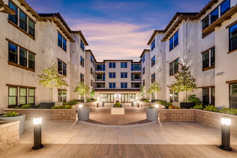 Villa Rotonda Apartments in Santa Rosa twilight courtyard area.